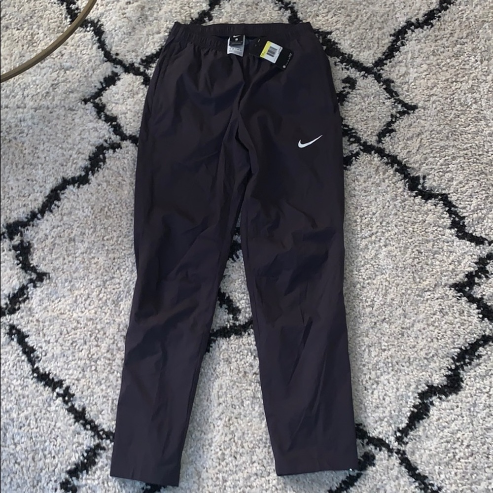 Nike Men’s Track Pants with zipper detail at legs
